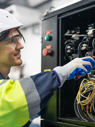 electrician-repairing-electrical-equipment-wearing-2026-03-16-01-15-36-utc.jpg
