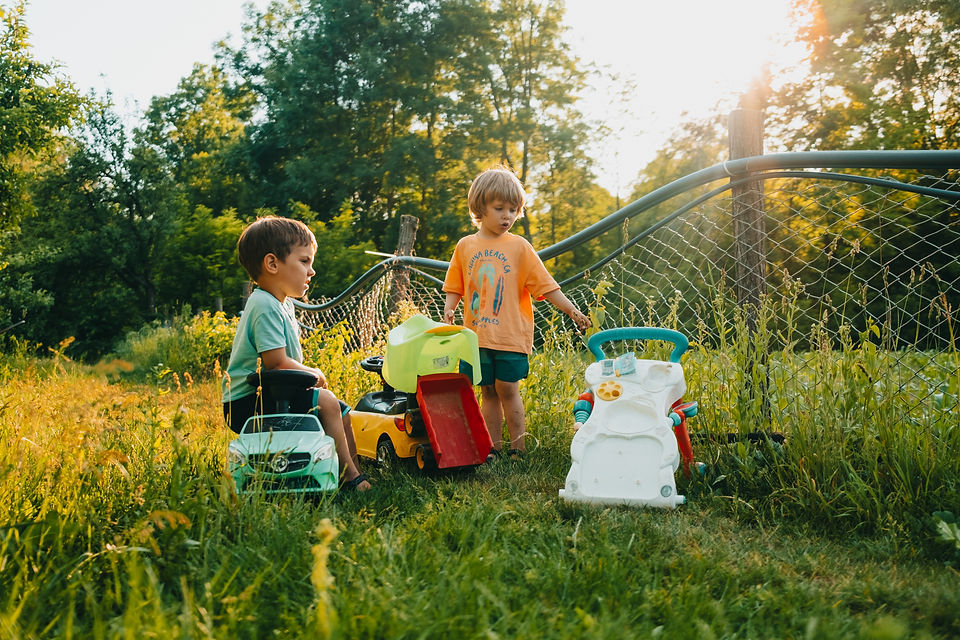 cute-little-boys-playing-together-on-green-summer-2026-01-08-07-30-59-utc.jpg