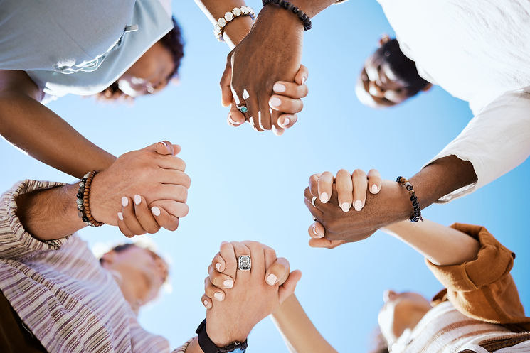 connected-people-holding-hands-in-a-circle-outdoor-2026-01-09-10-38-36-utc.jpg