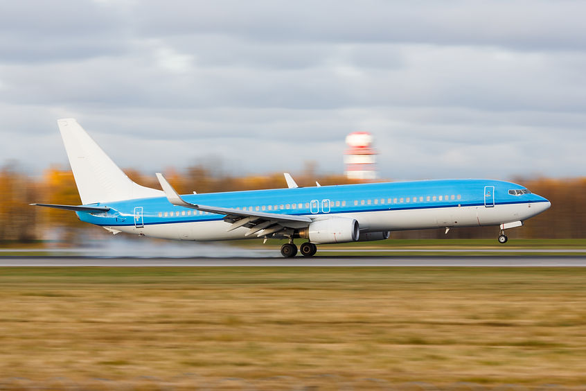 passenger-airplane-landing-with-touchdown-on-the-r-2026-03-19-09-25-10-utc.jpg