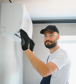 technician-man-in-uniform-installing-repairing-ai-2025-03-16-06-59-45-utc.jpg