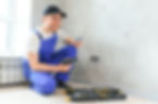 confident-professional-electrician-in-uniform-usin-2025-03-13-08-41-03-utc.jpg