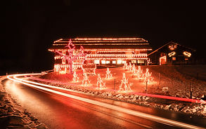 festive-house-decoration-with-light-streaks-at-nig-2026-03-16-00-40-47-utc.jpg