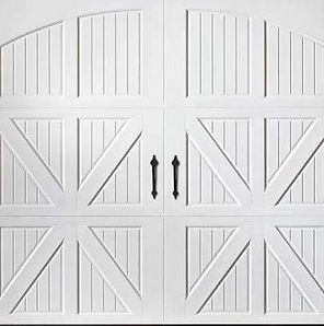 White carriage house new garage door