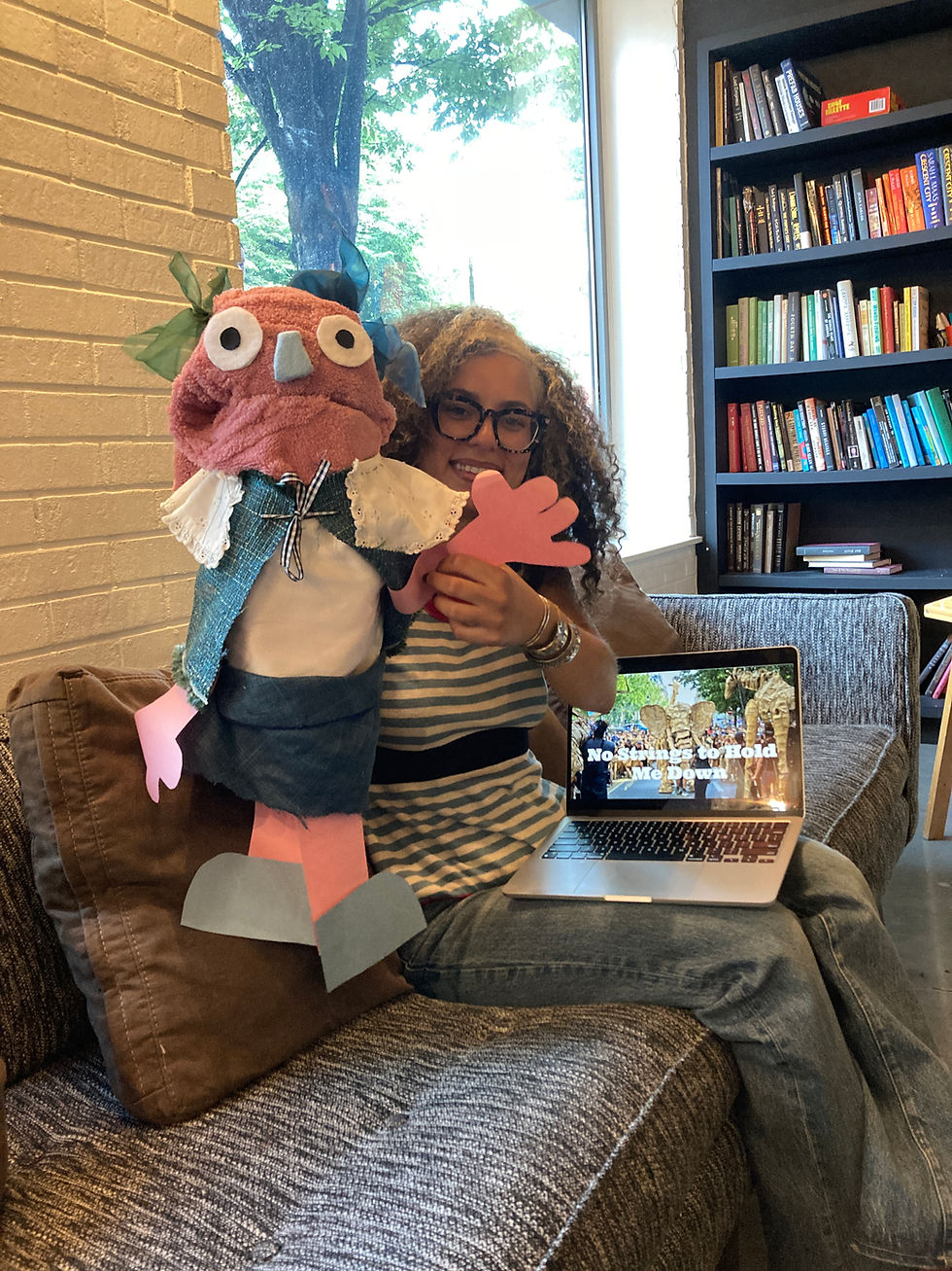Jules introduces the lesson with her puppet Penelope