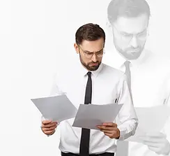 young-business-man-serious-writing-on-clipboard-h-2023-11-27-04-49-00-utcDE.webp