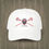 Thumbnail: A white colored Retro Canadian Lacrosse baseball cap with crossed sticks, maple leaf mask, and vintage design