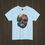 Thumbnail: Baby blue Nature Before and After Skull Graphic Tee - Skull split in half, one side nature, the other dark and sad.