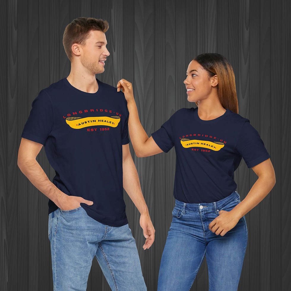 Couple wearing navy blue Austin Healey T-Shirt with a yellow winged background with 'Austin Healey' in black and red text.