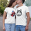 Thumbnail: Couple wearing our hand-drawn Siberian Husky sketch on a white t-shirt for dog lovers.