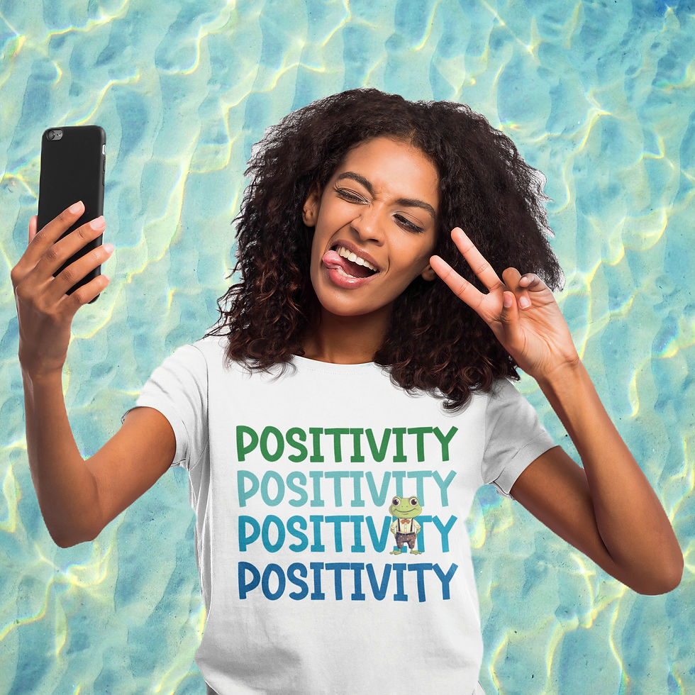 Girl wearing a white positivity frog graphic t-shirt with stacked positivity text