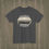 Thumbnail: Charcoal colored Healey roadster t-shirt with “Est. 1952” and checkered flags