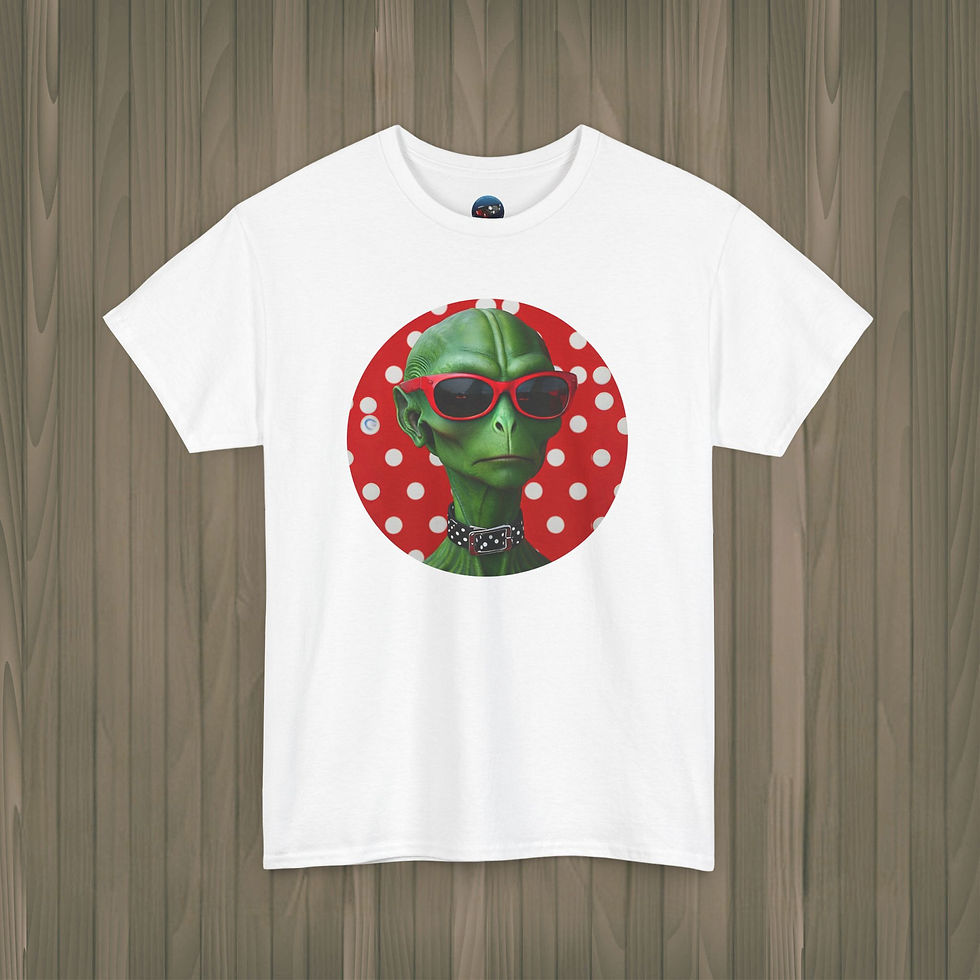 White tee with green alien wearing red sunglasses and spiked collar in front of a red polka dot background