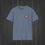 Thumbnail: Front of indigo blue Austin Healey T-shirt with a black, red, & white emblem on the top left chest with Co. info in black