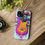 Thumbnail: iPhone sitting on a desk with our colorful psychedelic guitar art phone case for iPhone and Samsung