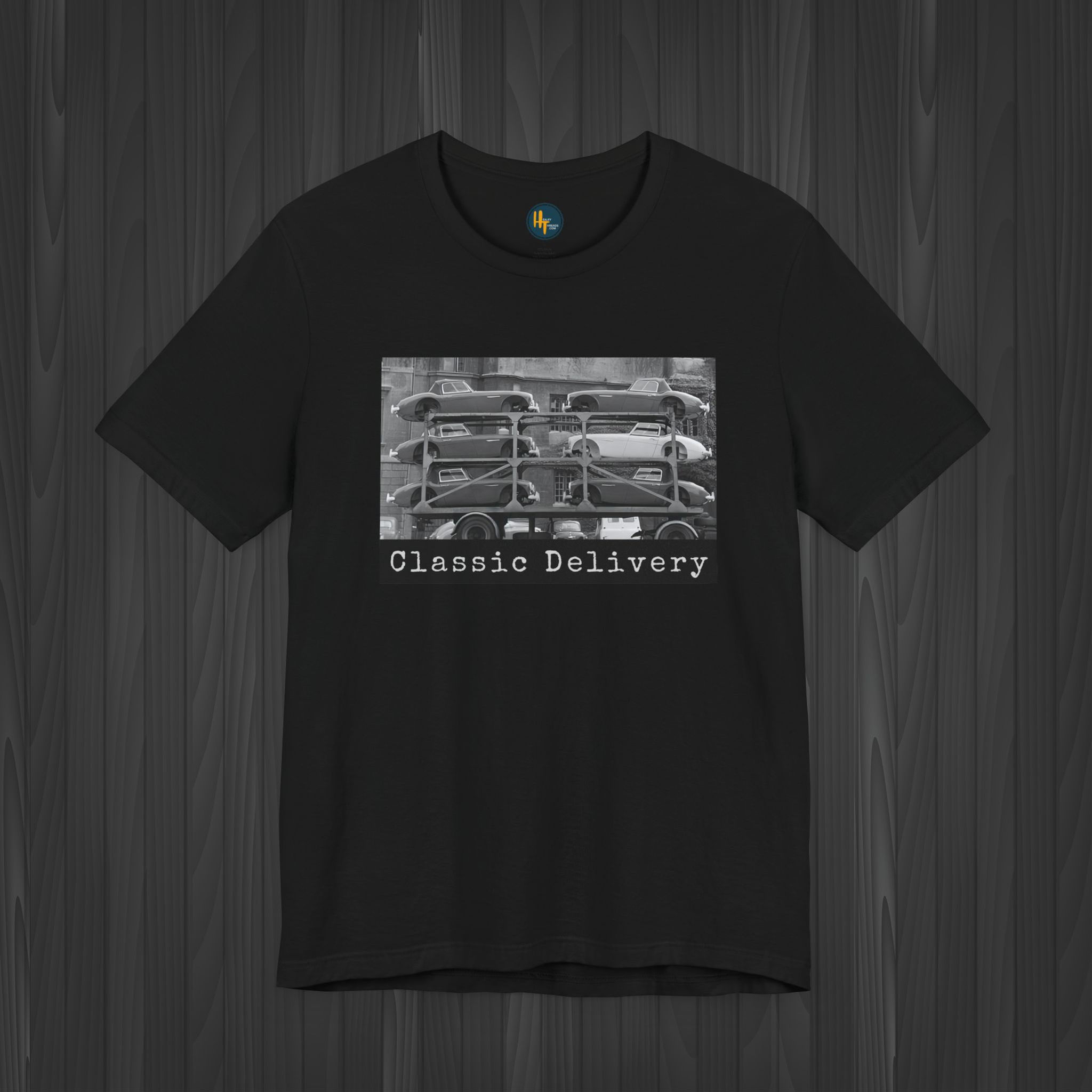 Black Limited Edition Austin Healey T-Shirt showcasing a late '60s auto hauler delivery graphic.