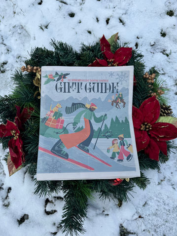 A holiday cover of Seven Days magazine illustrated by Alex Mauss. Featuring people skiing, sledding, and riding moose while delivering gifts. 
