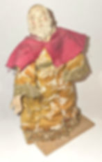 Figure de roFigure de roi mage à genoux - dos