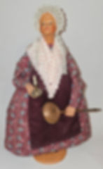 La femme au bougeoir et à la bassinoire