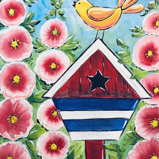 Yellow bird on red, white, and blue birdhouse surrounded by pink hollyhock flowers and blue sky.