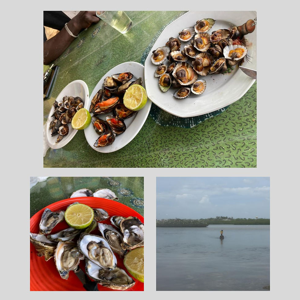 Des fruits de mer sur une table et une femme dans l'eau