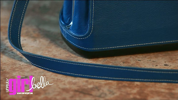 unruly-girl-bella-strap-closeup_png_proj