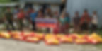 Children stand with a consignment of aid in Nepal during the Covid pandemic.