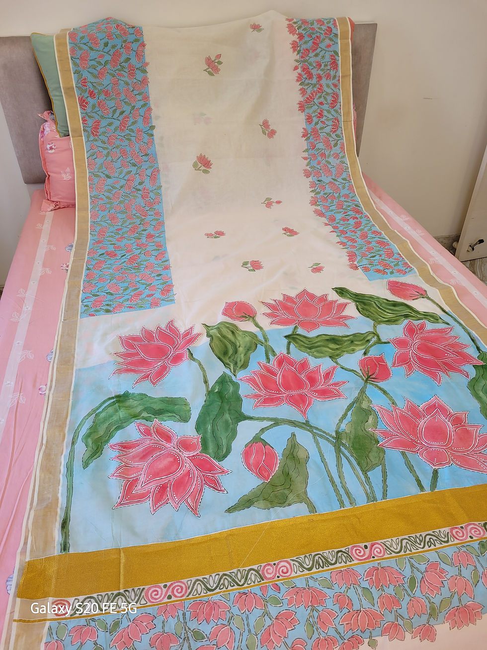 Thumbnail: Flower-designed hand-painted cotton saree with a designer blouse piece