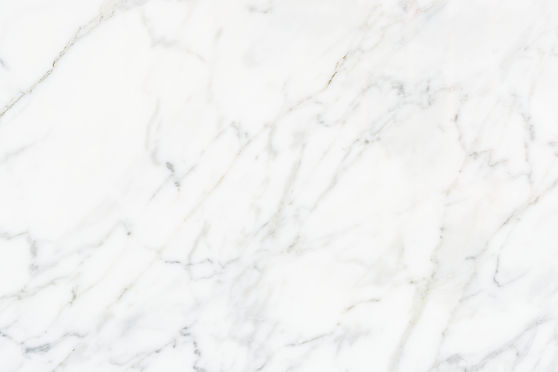 close-up-white-marble-textured-wall.jpg