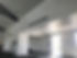 Spacious hall interior with freshly painted white walls
