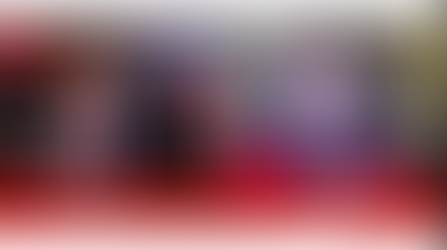 Woman and Man Speaking on BBC News Screen