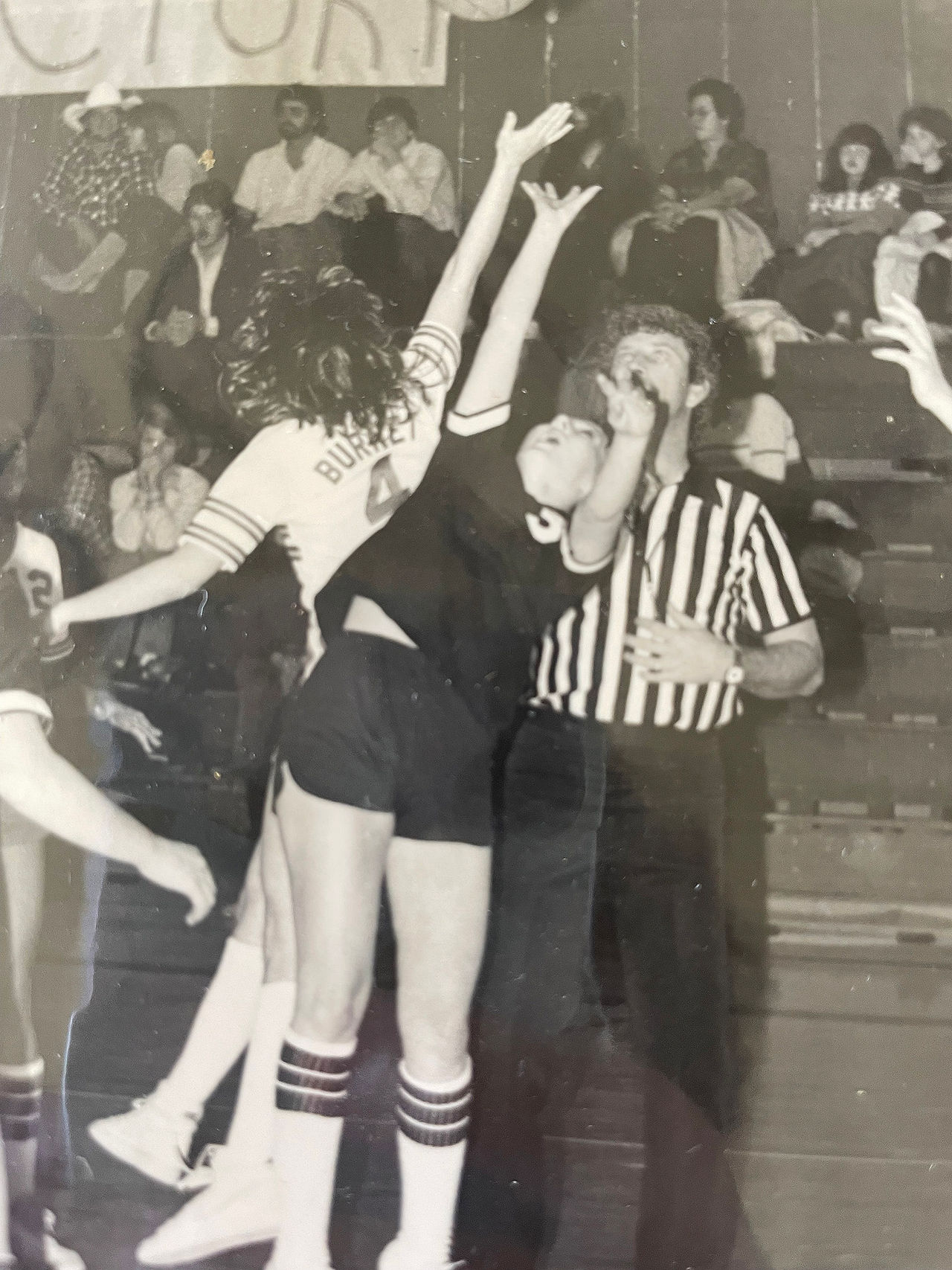 Alice Price playing on high school basketball team. 