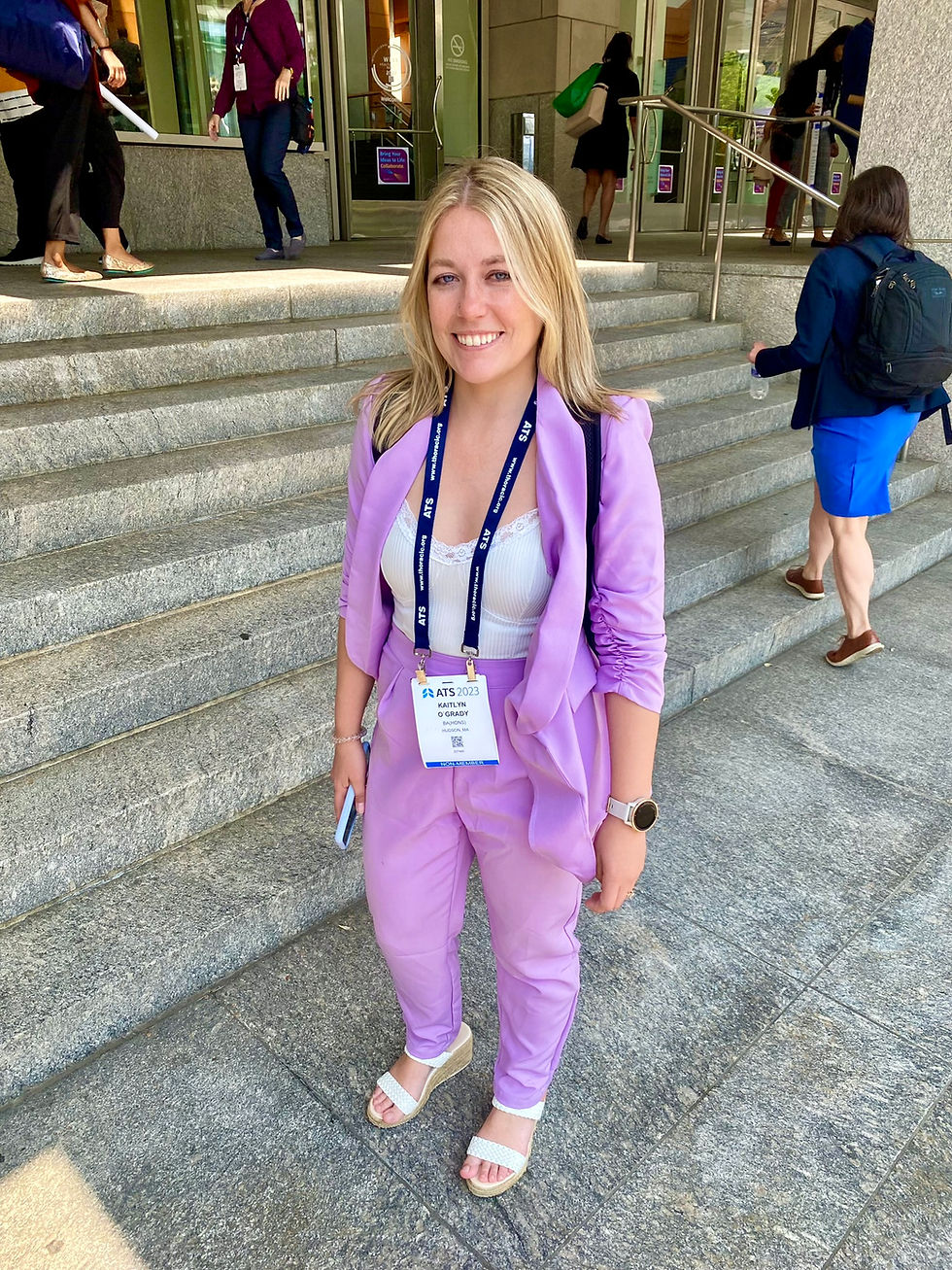 Katie standing outside the conference center before her speech at the ATS