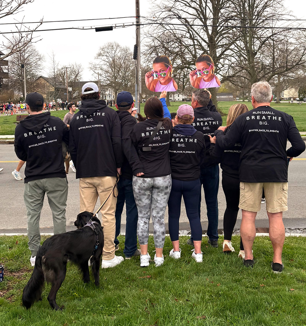 Katie O'Gradys fans cheering her on at marathon