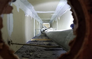 W - 23 Looking in Ceiling Cavity.jpg