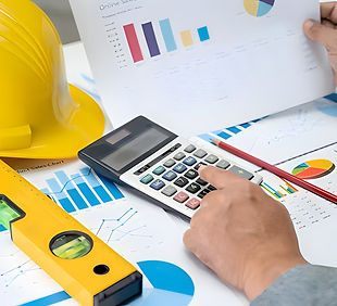 asian-engineer-with-architectural-house-plan-project-blueprint-graph-yellow-helmet-enginee