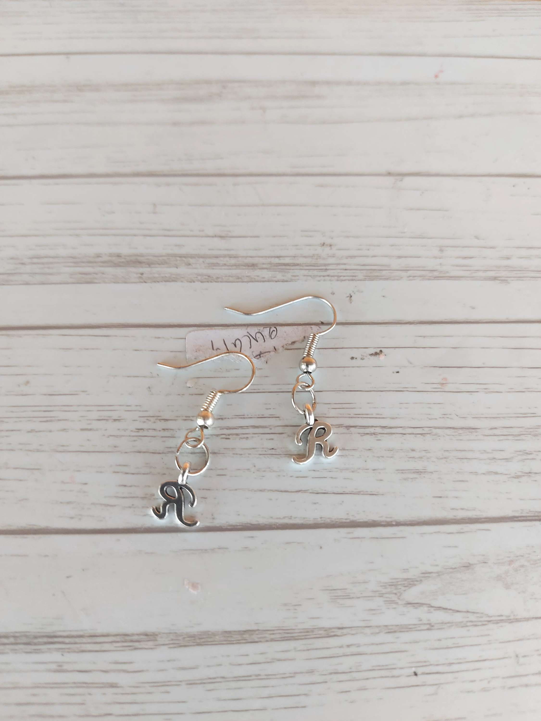 Boucle d'oreille stainless lettre R