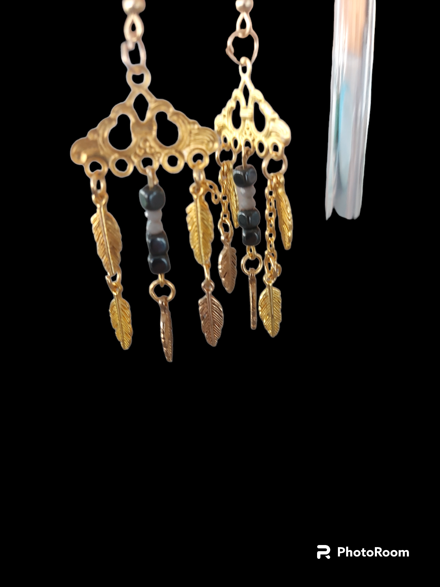 Boucle d'oreille avec plume tige stainless 