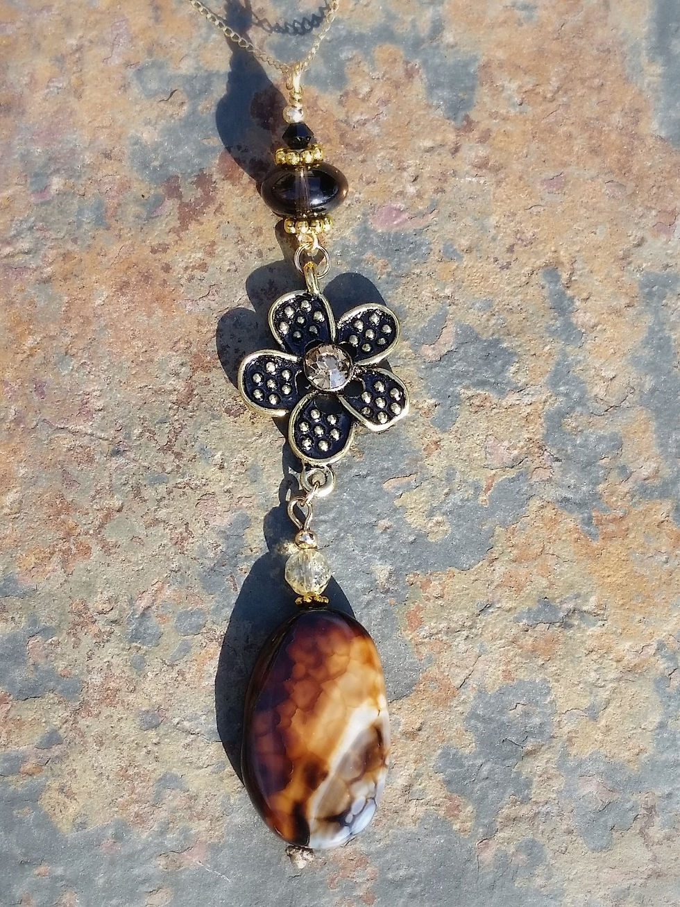 Thumbnail: Dark Carmel Agate with flower accent