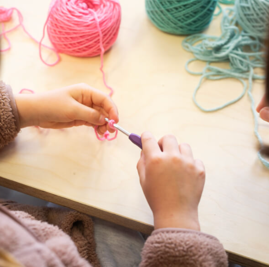 WhatsApp message from a student praising Kirsty’s supportive crochet teaching during the Hexi Cardigan course.