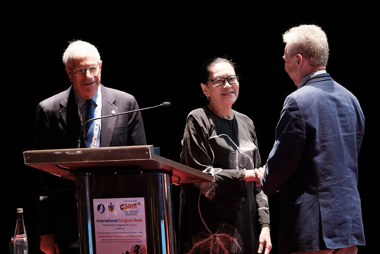 At the podium handshake