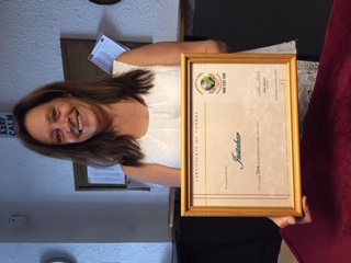 Tracey with her certificate