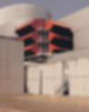 The air filters, with their red roofs, attached to the turbine hall at the TotalEnergies power plant in Toul, France, June 12, 2025. Hoping to help grid operators adapt to changes buffeting the power markets, TotalEnergies is assembling a portfolio of battery farms and natural-gas-fired power plants. (Desiré van den Berg/The New York Times)