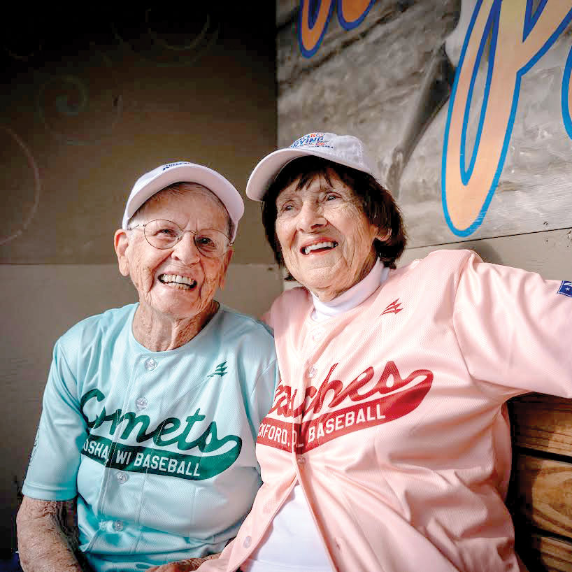 Ann Petrovic, left, and Jeneane “Lefty” Lesko at Beyer Stadium in Rockford, Ill., July 24, 2026. As a group of players from an all-women’s baseball league in the 1940s and ’50s gathered at a recent reunion, the future of women’s baseball looks bright again. (Jamie Kelter Davis/The New York Times)