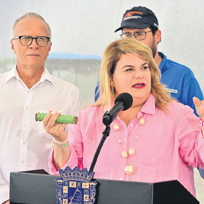 Governor touts $900 million reduction in contracts in 15 months.