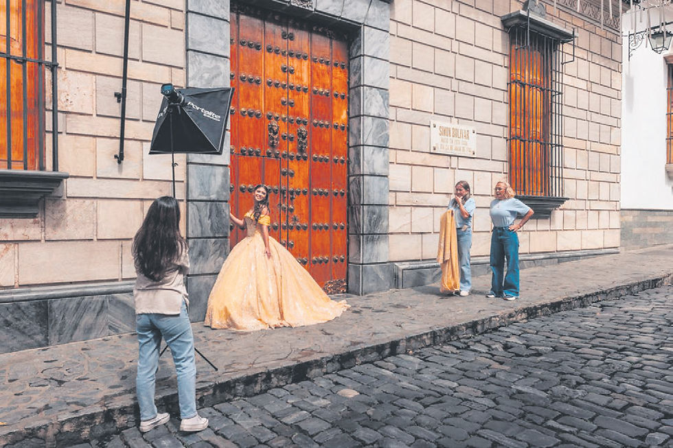 Constanza Sofía Arungeren poses for photos for her quinceañera celebration by the birth home of revered liberator Simon Bolivar, in Caracas, Venezuela, Sept. 22, 2025. On a visit to Venezuela, The Times found a nation bracing for potential U.S. military action. (Adriana Loureiro Fernandez/The New York Times)
