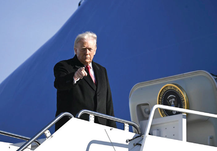 President Donald Trump departs Joint Base Andrews in Maryland, en route to Michigan on Tuesday, Jan. 13, 2026. (Kenny Holston/The New York Times)