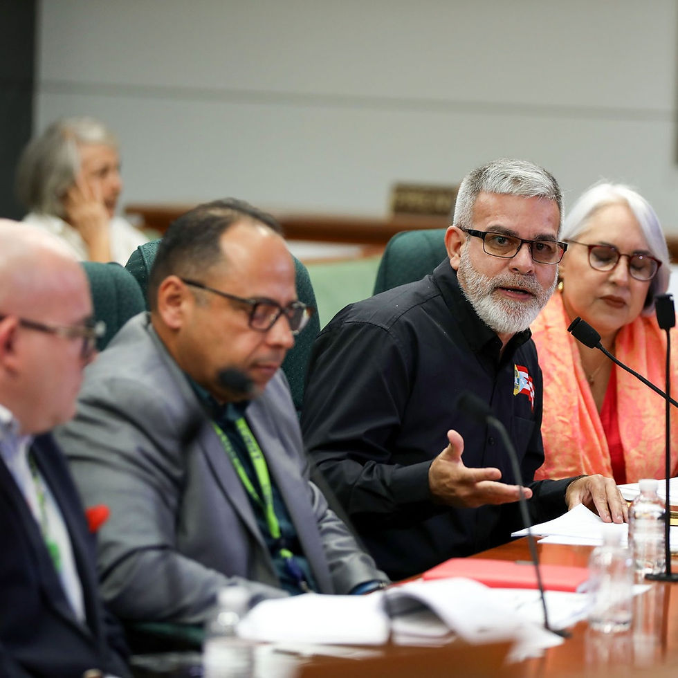 Ángel Figueroa Jaramillo, second from right, president of the Electrical Industry and Irrigation Workers Union, argues that although the Puerto Rico Electric Power Authority was dismantled during the privatization process, the components needed to rebuild the operation as a public entity still exist.