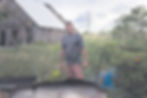 Humberto Palmero in his backyard, where he makes gasoline from plastic chips, in Pinar del Rio, Cuba on July 1, 2026. (Lisette Poole González/The New York Times)