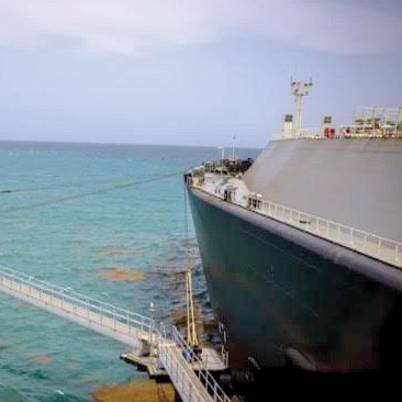 Crowley marks one year of LNG carrier in service to island.